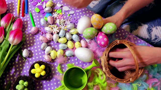 Woman-sorting-Easter-decorations