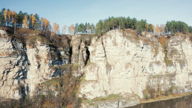Aerial-view;-camera-making-panorama-of-landscape-with-cliffs-forest