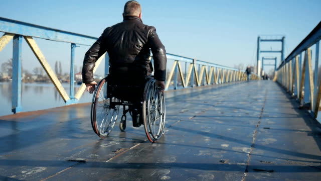 Disabled-male-in-wheel-chair,self-confidence