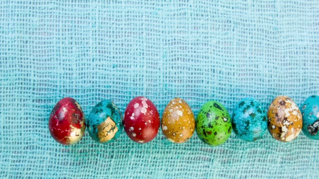 Multicolored-beautiful-Easter-eggs-lined-in-a-row.