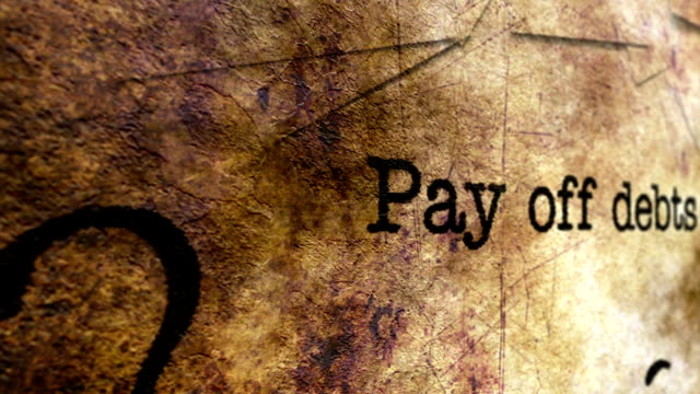 Pay-off-debts-grunge-concept