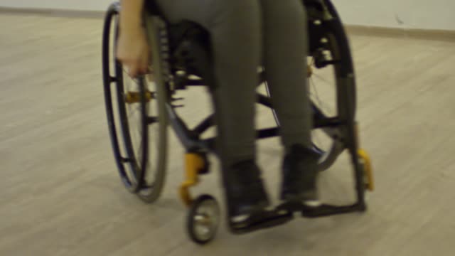 Male-Choreographer-Dancing-with-Paraplegic-Woman