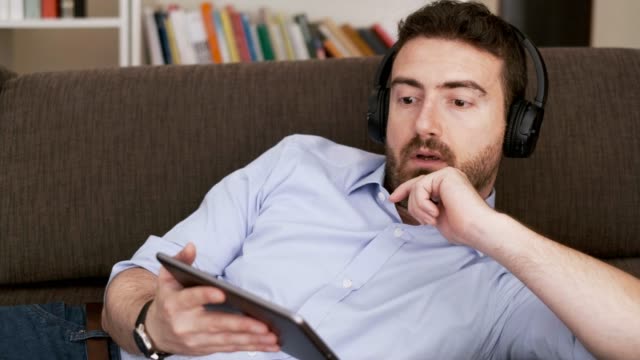 Video-about-man-listening-to-music-at-home