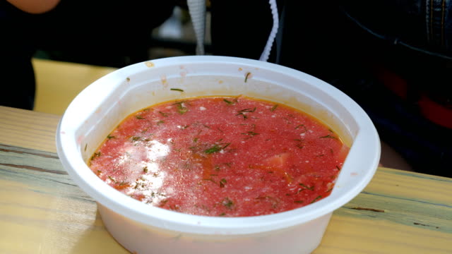 Tourist-eats-borscht.-Close-up.
