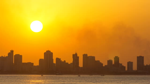 Kuwait-cityscape-during-the-sunset-timelapse