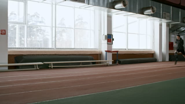 Adaptive-Sportsman-with-Artificial-Leg-Running-on-Track