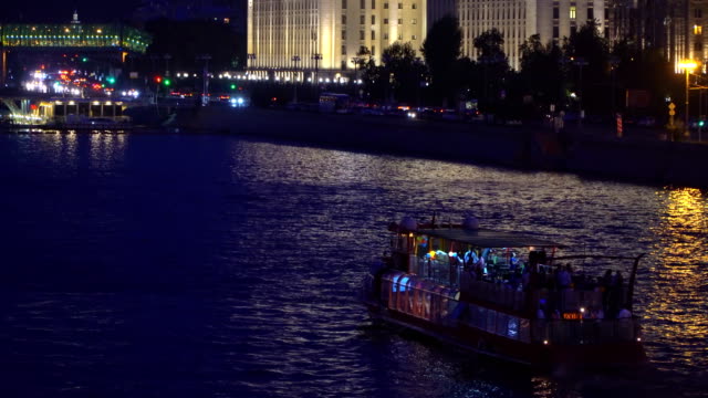 night-traffic-of-pleasure-boats-on-a-city-river