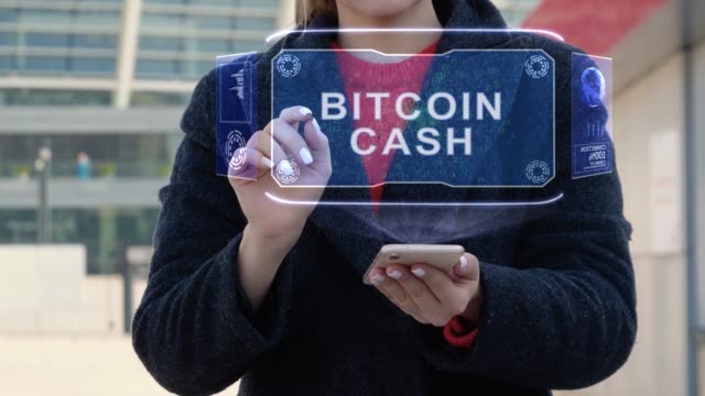 Woman-interacts-HUD-Bitcoin-cash