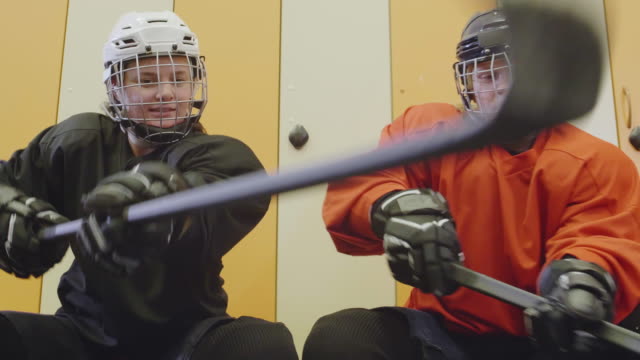 Female-Hockey-Team-in-Cloakroom