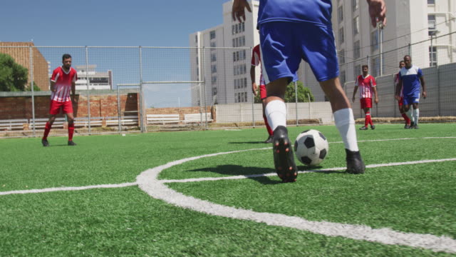Soccer-players-having-match-on-field