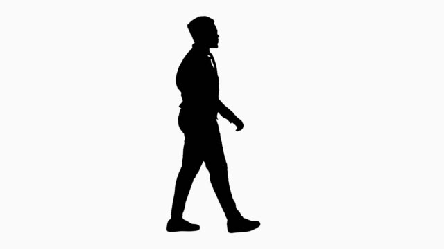 Silhouette-Afroamerican-Jazz-Musician-with-Trumpet-Walking-and-Playing