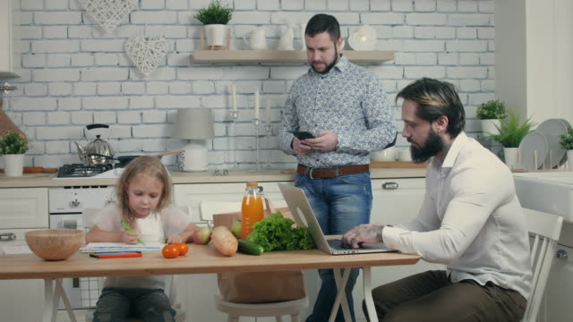 Family-using-their-gadgets-at-home