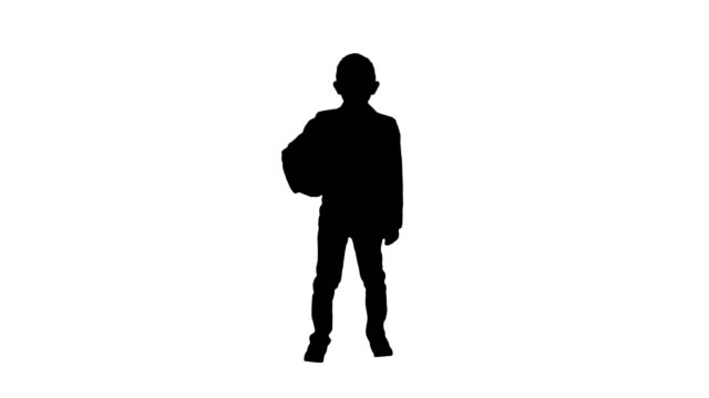 Silhouette-Happy-young-school-boy-holding-a-football