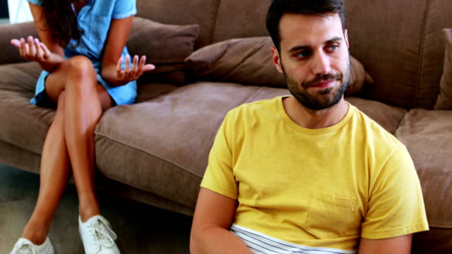 Couple-arguing-with-each-other-in-living-room
