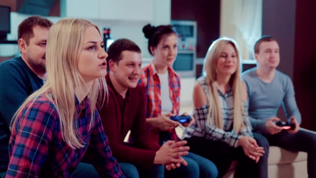Friends-playing-video-games-in-the-flat
