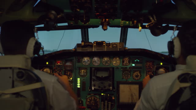 Pilots-Taking-off-Airplane