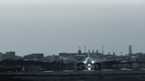 Jet-plane-landing-with-heat-haze-in-monochrome