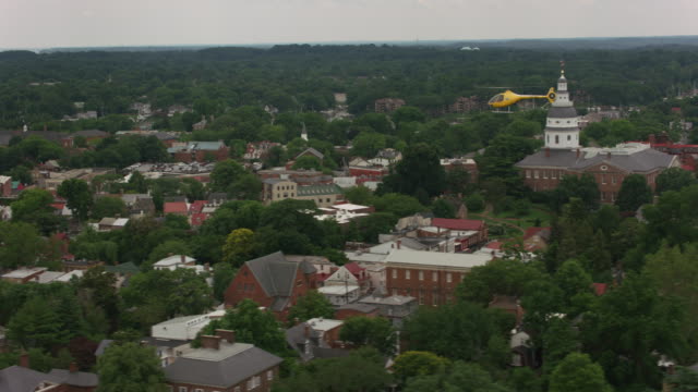Aerial-shot-of-helicopter-flying-over-Annapolis,-Maryland.