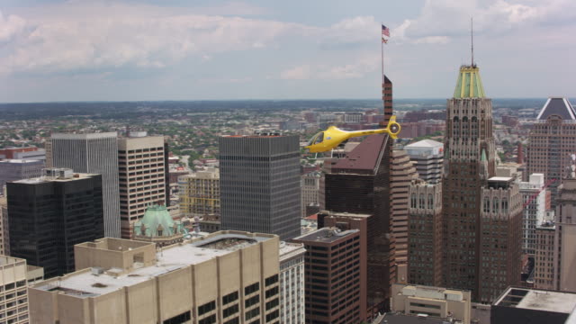 Aerial-shot-of-helicopter-flying-over-Baltimore,-Maryland.