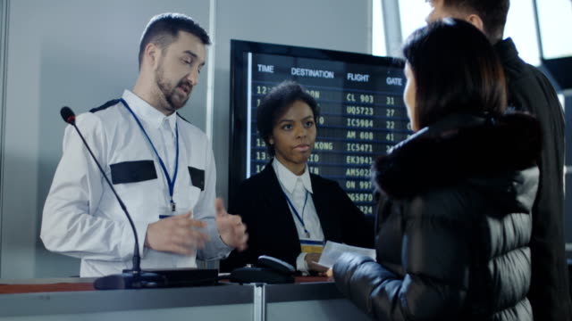 Businesspeople-having-visa-denial-problem-in-airport