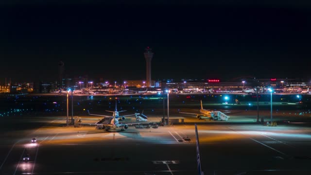Aircraft-transportation-traffic-in-runway-or-taxiway-at-night-in-airport-time-lapse.