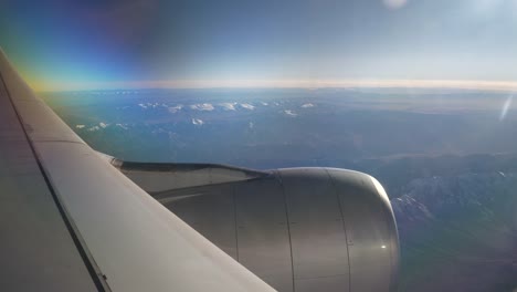 sunny-day-flying-airplane-engine-passenger-window-view-panorama-4k-china