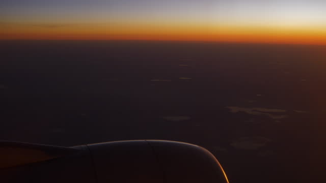 asiento-de-la-ventana-de-la-avión-puesta-de-sol-en-china-motor-4k