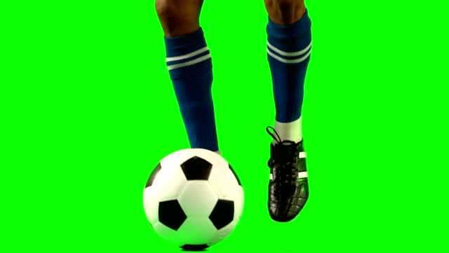 Football-player-controlling-the-ball