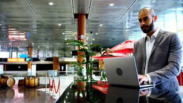 Businessman-using-a-laptop