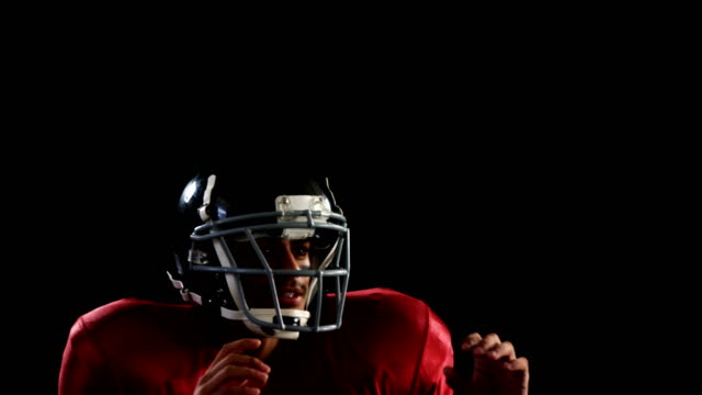 American-football-player-catching-the-ball-4k