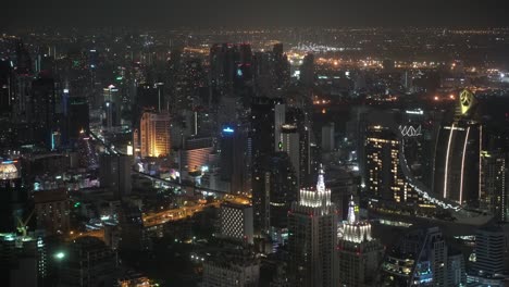 illumination-of-the-night-city.-business-centers-and-corporate-buildings,-offices-and-financial-centers.-architecture-of-the-metropolis.-urban-style