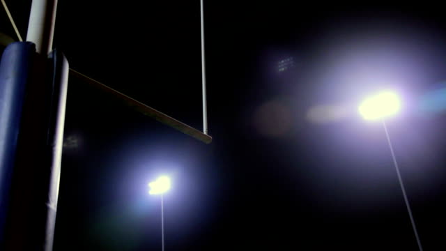 Goalpost-in-Stadium-at-Night