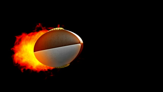 Rugby-Feuerball-in-Flammen-auf-schwarzem-Hintergrund