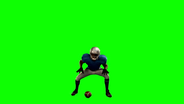 American-football-player-in-attack-stance