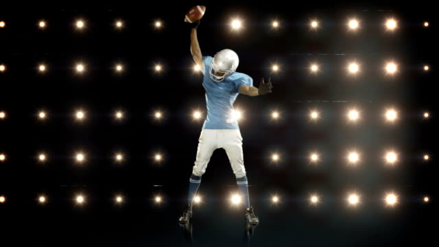 American-football-player-against-flashing-lights