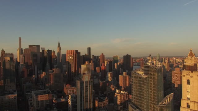 Zoom-Out-Shot-Of-Midtown-With-Chrysler-Building-&-432-Park-Ave-In-Shot