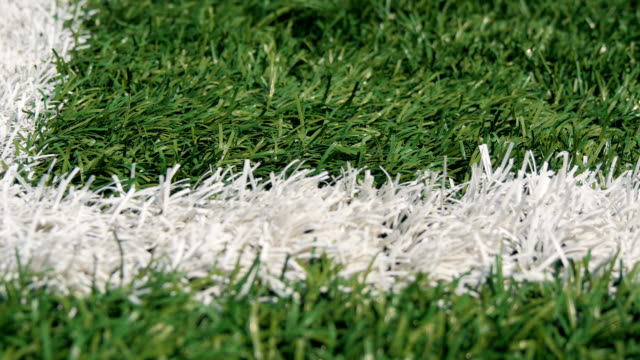 Nahaufnahme-der-heraus-der-bounds-Linien-auf-einem-Rasen-football-Feld