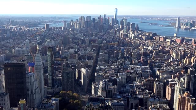 Panoramic-and-aerial-view-of-Manhattan-buildings-in-New-York-City,-NY,-USA.-New-york-city-skyline-aerial-view-at-sunset.-Urban-metropolis-landmark-scenery-background.