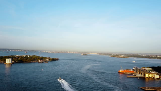 Aerial-view-of-New-York,-America.-Famous-sights-East-river,-Governors-island-and-statue-of-liberty-on-the-horizon