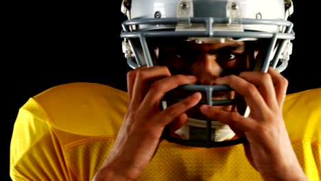 American-football-player-with-a-head-gear-4k