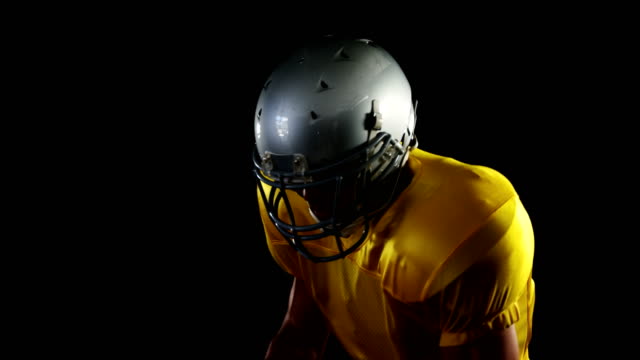 American-football-player-catching-the-ball-and-throwing-4k