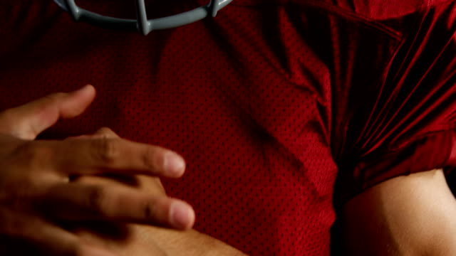 American-football-player-clenching-hands-4k