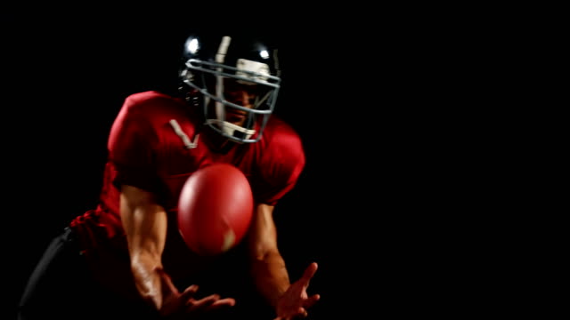 American-football-player-catching-the-ball-4k
