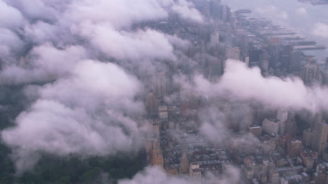 Aerial-view-of-Central-Park-and-Manhattan-through-clouds.