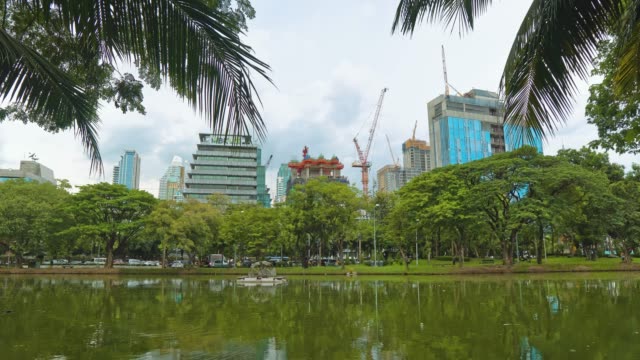 construction-of-office-corporate-buildings-overlooking-the-green-park-and-the-lake