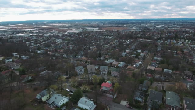 Cliffside-Park-NJ-Flyover-Shot-Of-Homes-With-Partly-Cloudy-Skies