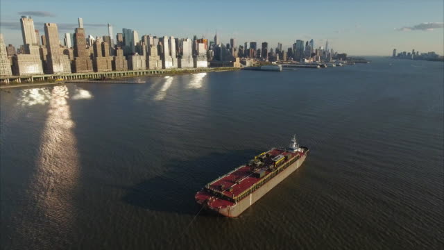 Stationary-View-Of-Oil-Tanker-&-Tug-Boat-on-Hudson-River-Viewing-Uptown
