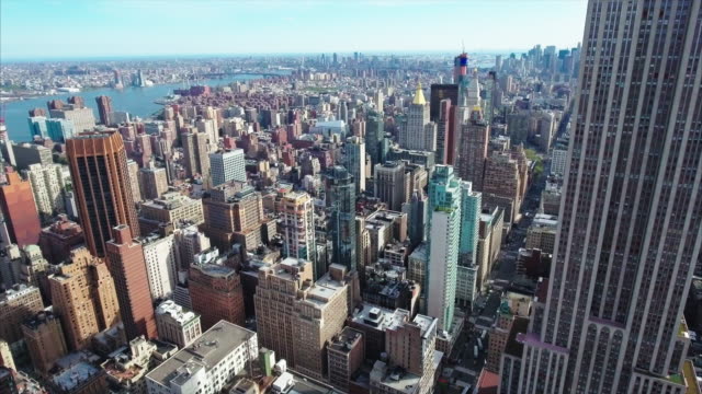 NYC-Midtown-Aerial-Of-Empire-State-Building-with-Other-Buildings-In-Back