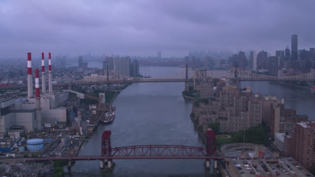 Flying-down-East-River-approaching-Queensboro-Bridge-at-sunrise.