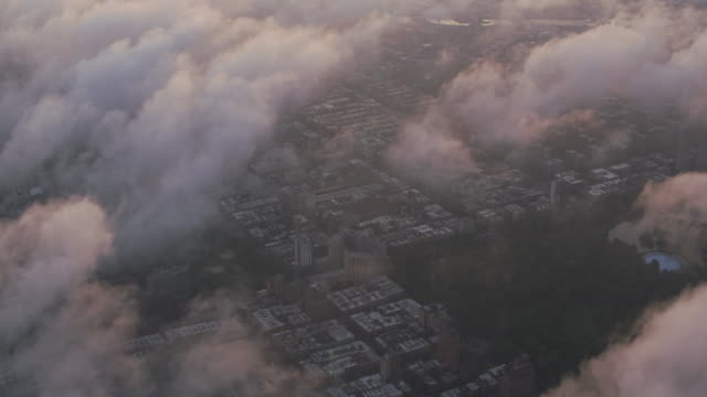 Aerial-view-of-Central-Park-and-Manhattan-through-clouds.